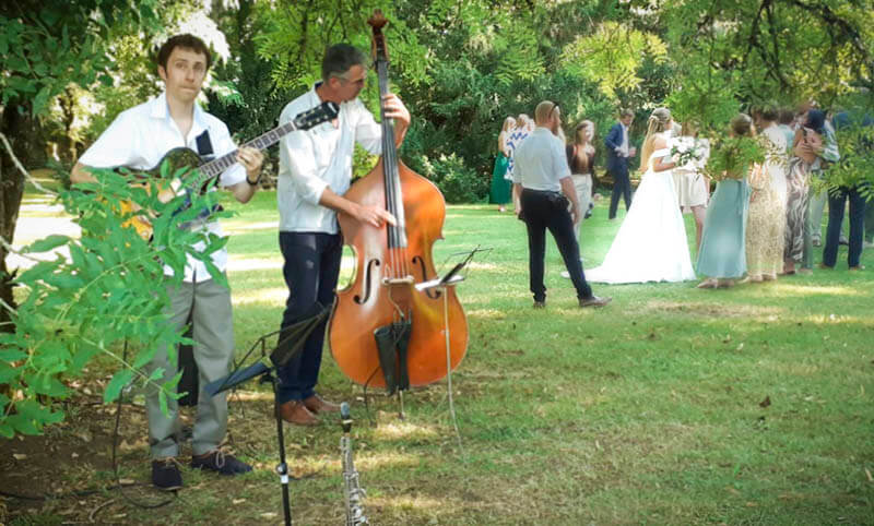 Live jazz band playing during a wedding cocktail hour in the South of France