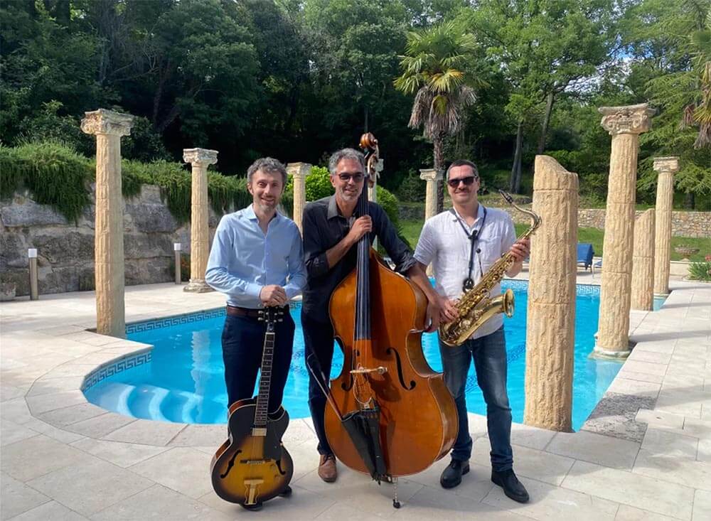 Live jazz musicians performing during an outdoor wedding reception in Provence